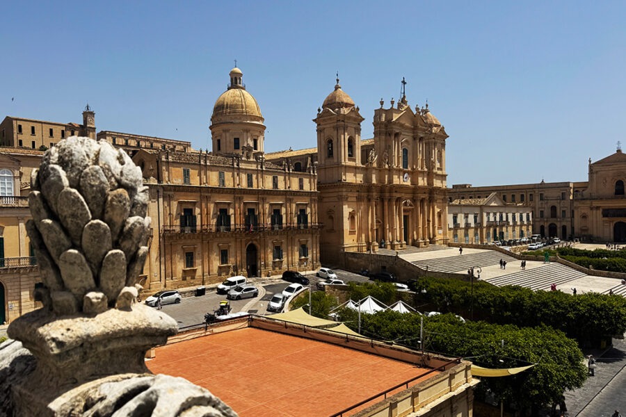 view of noto cathedral from rooftop of nearby church