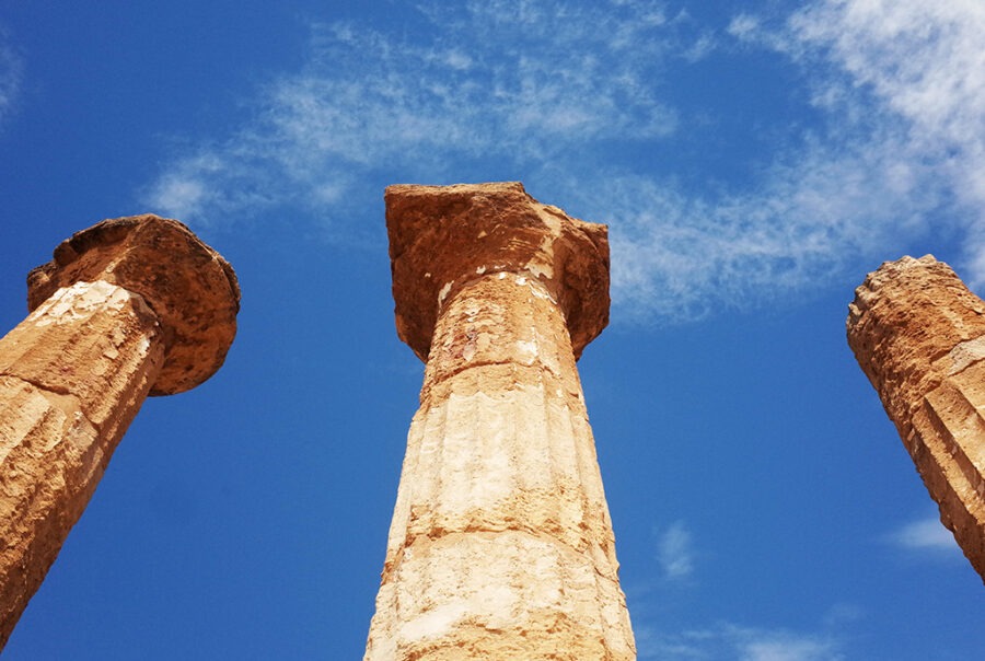 close up view of 3 columns in agrigento valley of the temples