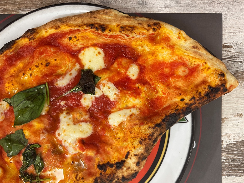 pizza calzone with tomato sauce and mozzarella in naples