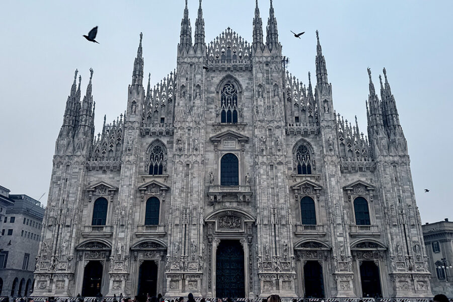 wide view of facade of milan cathedral