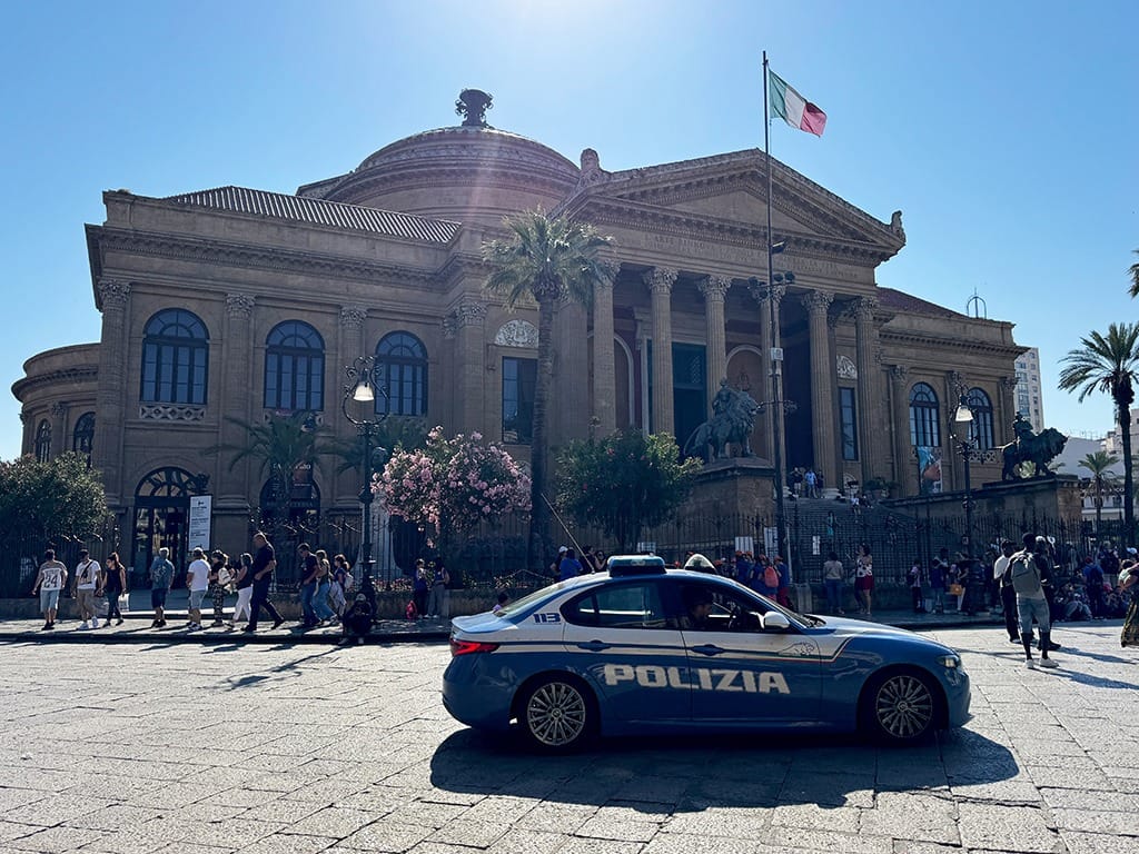 italian police car in front of teatro massimo palermo opera house