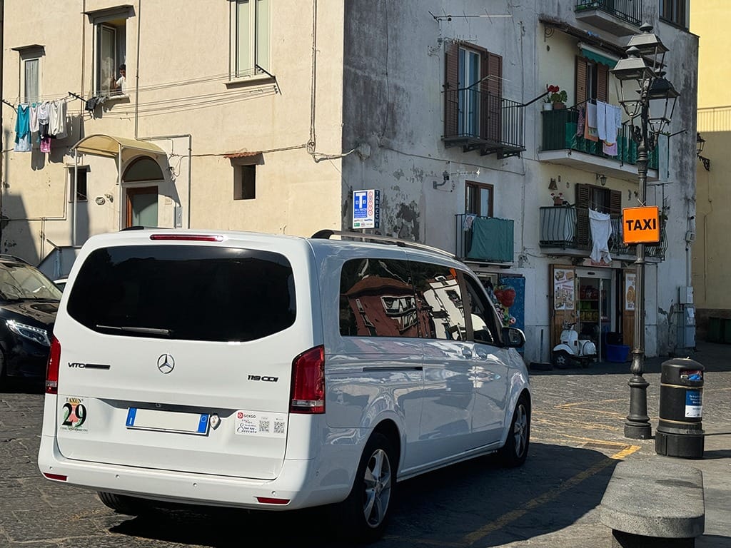 white taxi at rank in sorrento marina grande