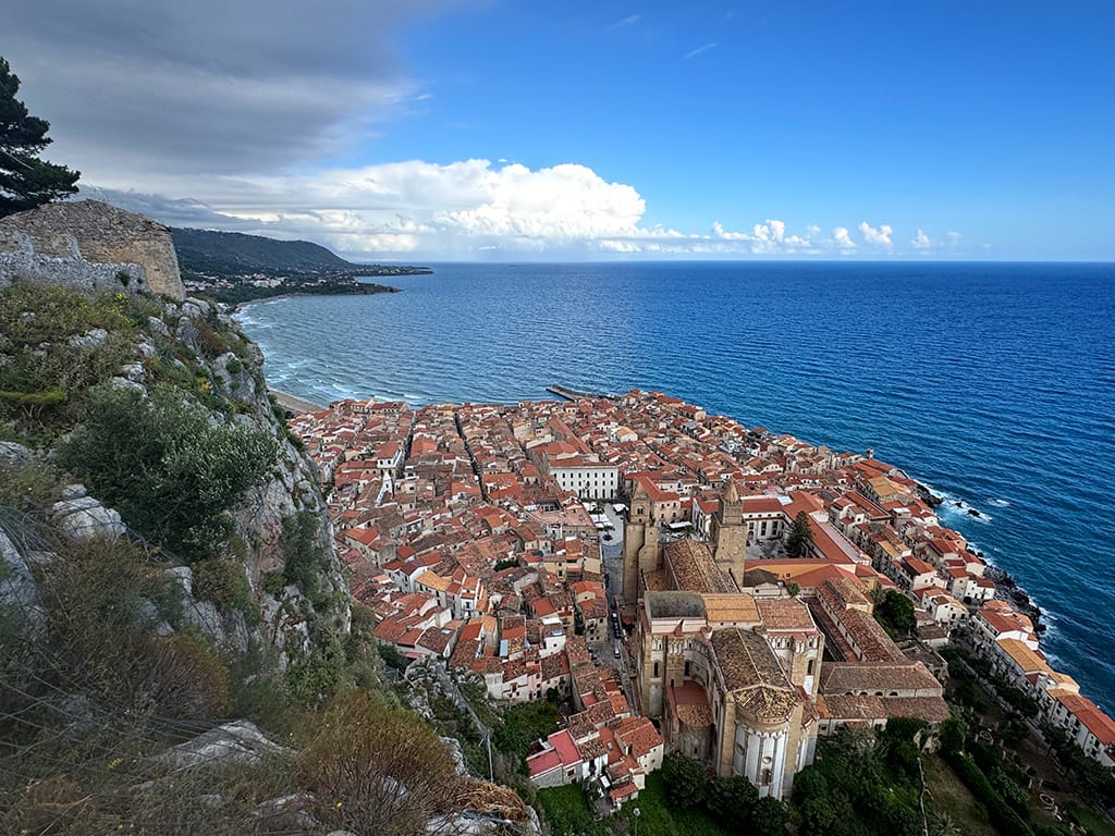view down to cefalu town from la rocca with the sea beyond