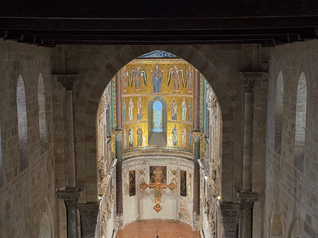 interior high view of mosaics behind altar in cefalu cathedral