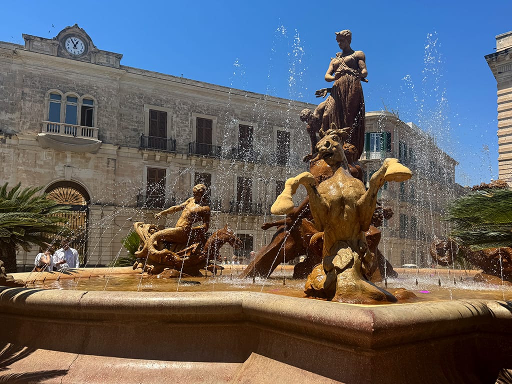 fountain of diana with water spray in ortigia