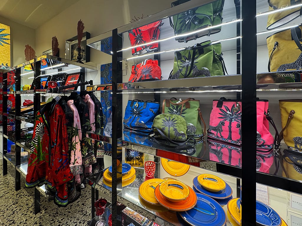 ortigia store display of colourful bags, plates and clothing
