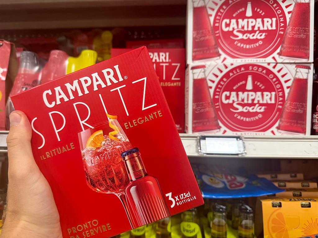 campari spritz and campari soda boxes in a supermarket