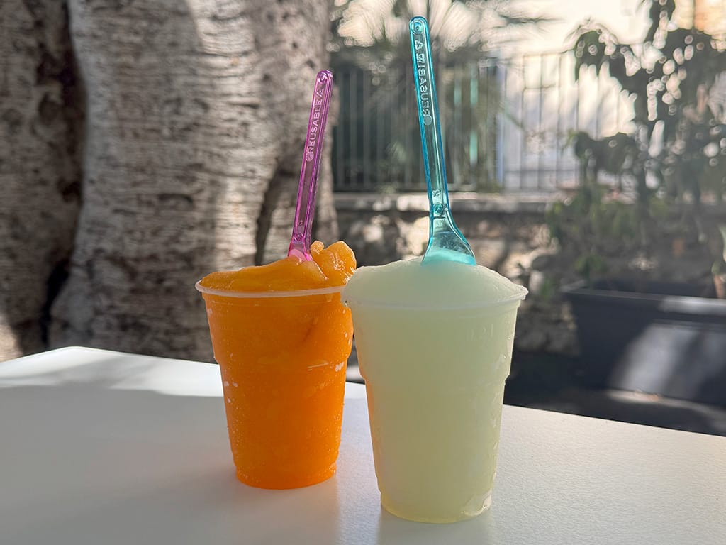 two plastic cups of granita