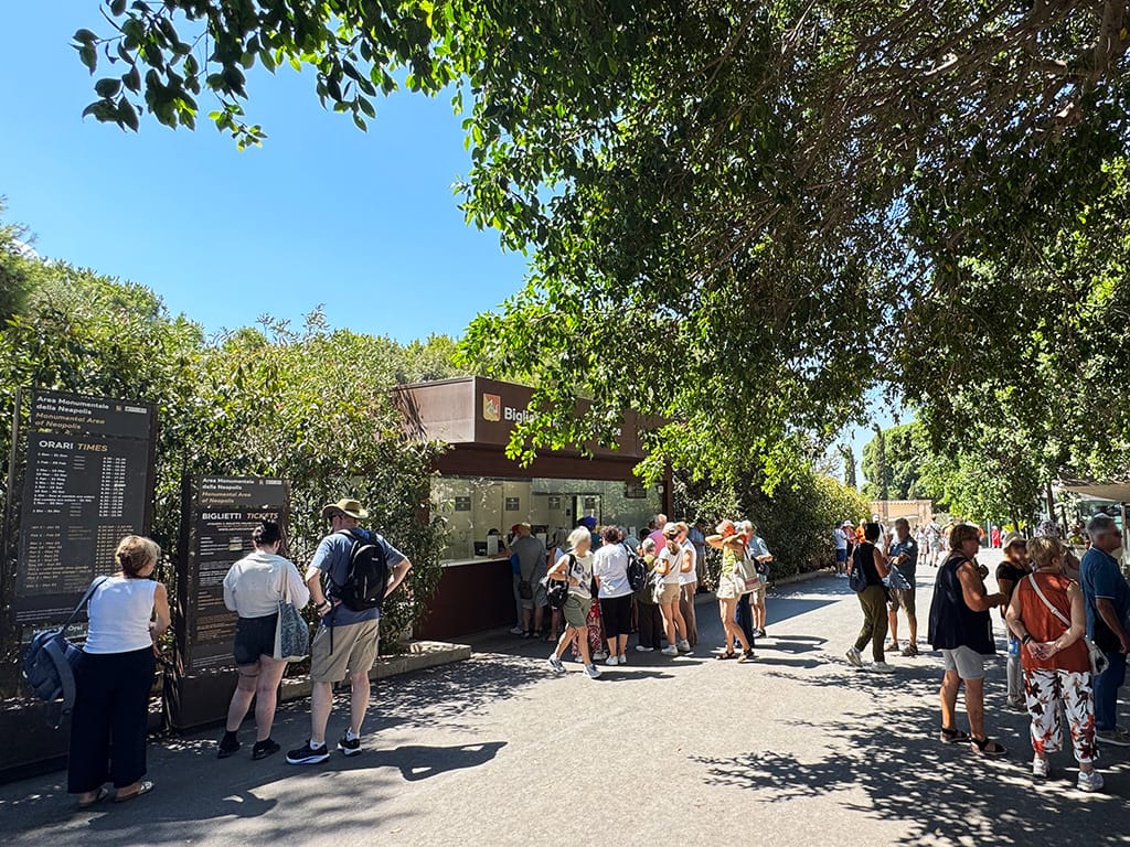 groups of people waiting at Neapolis Archaeological Park ticket entrance